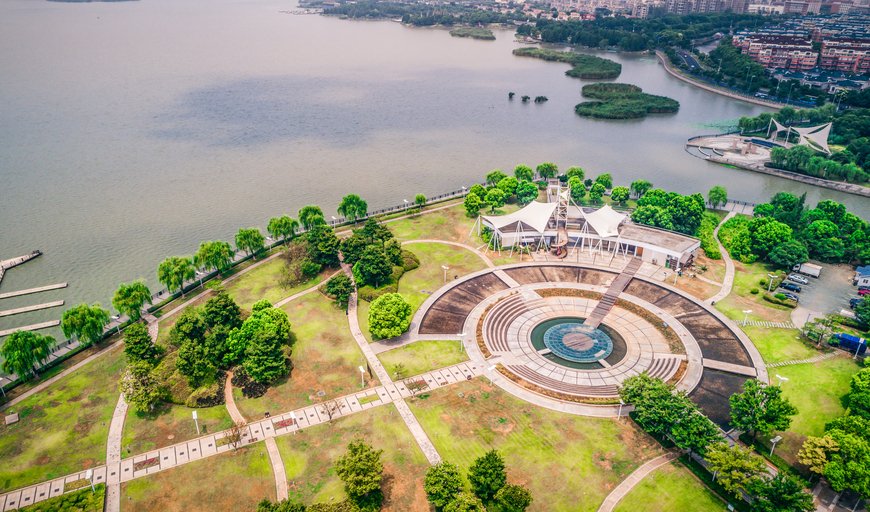 Empty square and lake in the city park